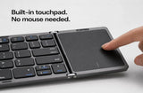 Foldable keyboard with built-in touchpad on a white background
